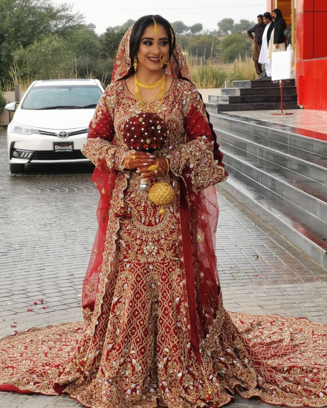 Traditional Red Pakistani Bridal Long Trail Gown with Golden Embroidery - DN-1444