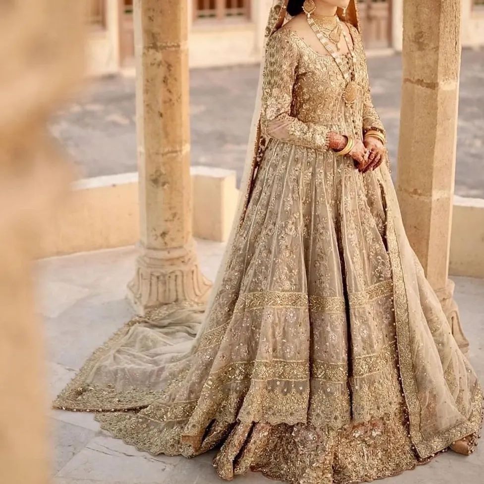 Golden Anarkali Bridal Lehenga with Long Trail & Intricate Embroidery- DN-1998