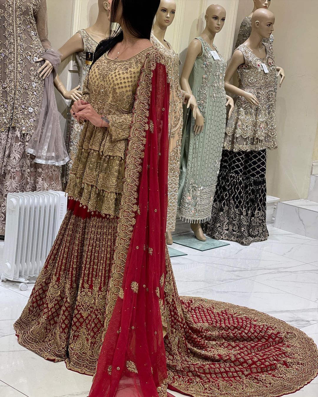 Pakistani Bridal Golden Peplum with Red long Trail Lehenga and Embellishment - DN-1637