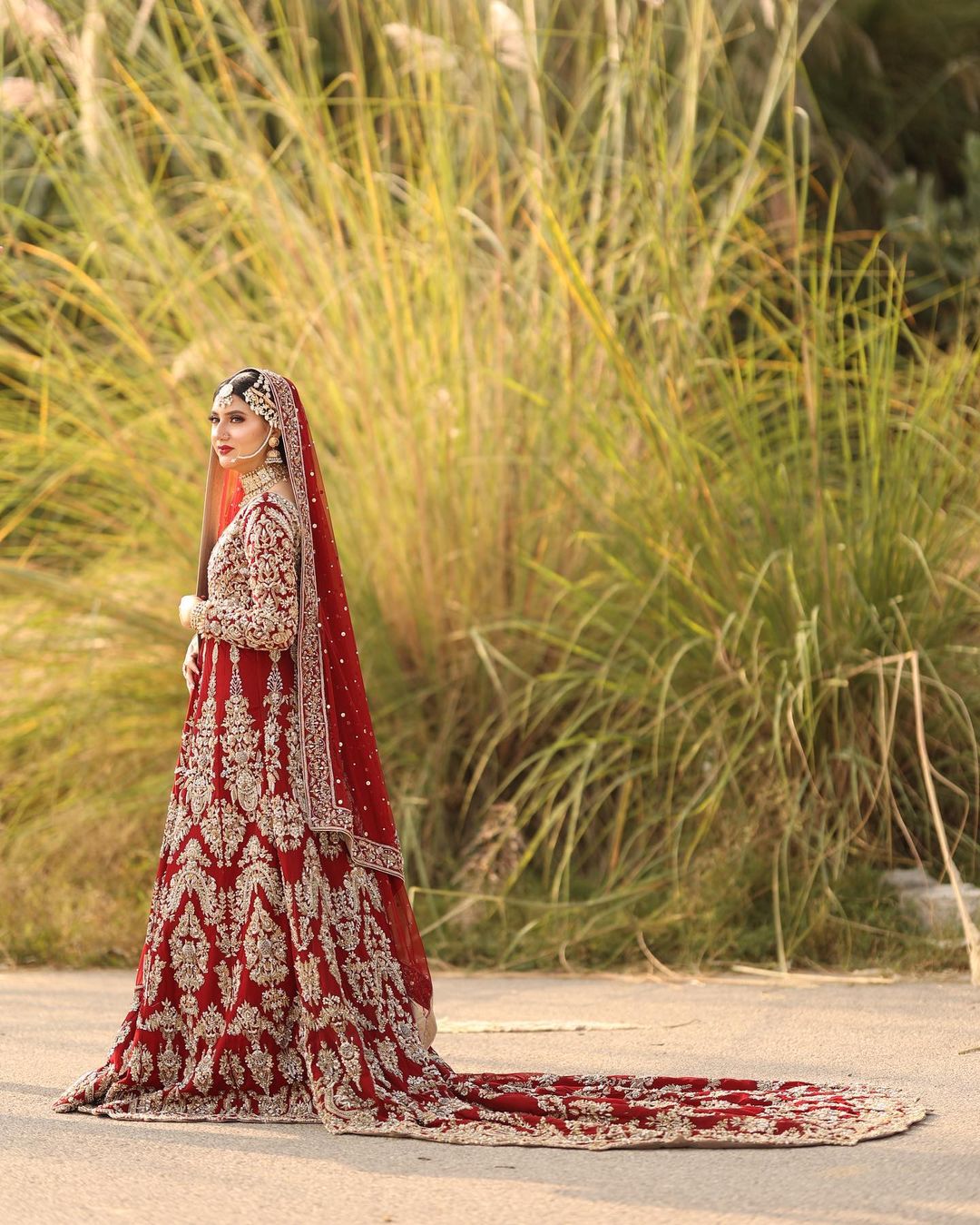 Pakistani Red Wedding Gown with Golden Embroidered Trail - DN-1588