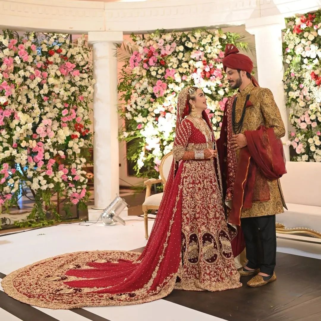 TRADITIONAL RED WEDDING LONG TRAIL GOWN WITH GOLDEN EMBROIDERY - DN-1945