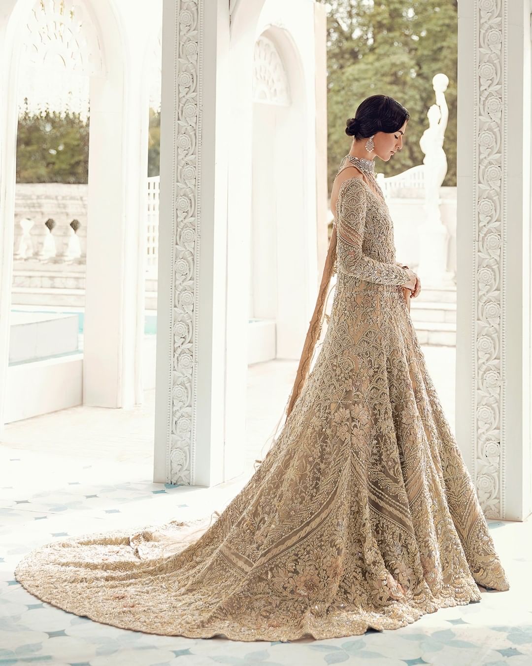 IVORY WEDDING GOWN WITH EMBROIDERED LONG TRAIL AND EMBELLISHMENT - DN-1938