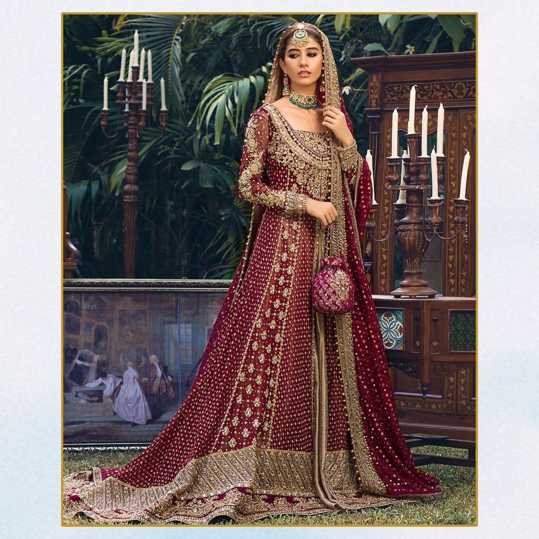 TRADITIONAL MAROON LONG KAMEEZ WITH LONG TRAIL LEHENGA AND EMBELLISHMENT - DN-1926