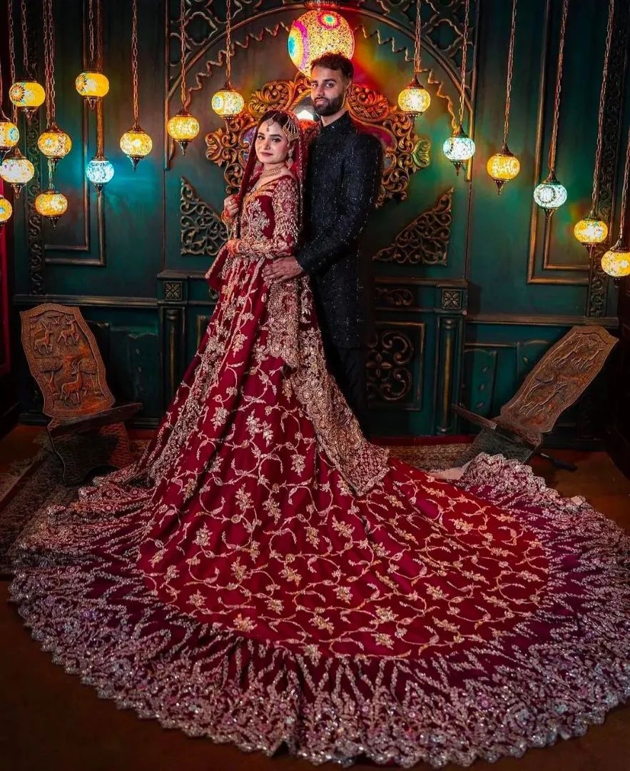 Red Classy Pakistani Wedding long Trail lehenga with short Split Jacket and Embellishment - DN-1346